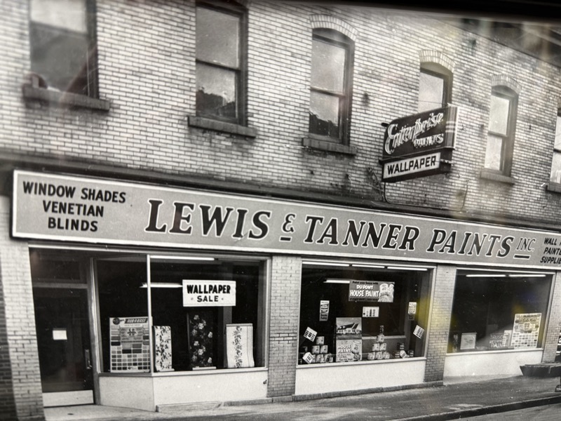 The original Lewis & Tanner storefront in Syracuse, NY — black and white archival photograph