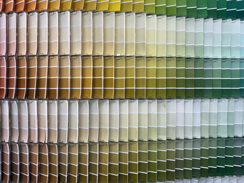 Paint chip samples in greens and yellows
